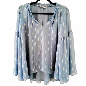 Jennifer Lopez blue feather blouse